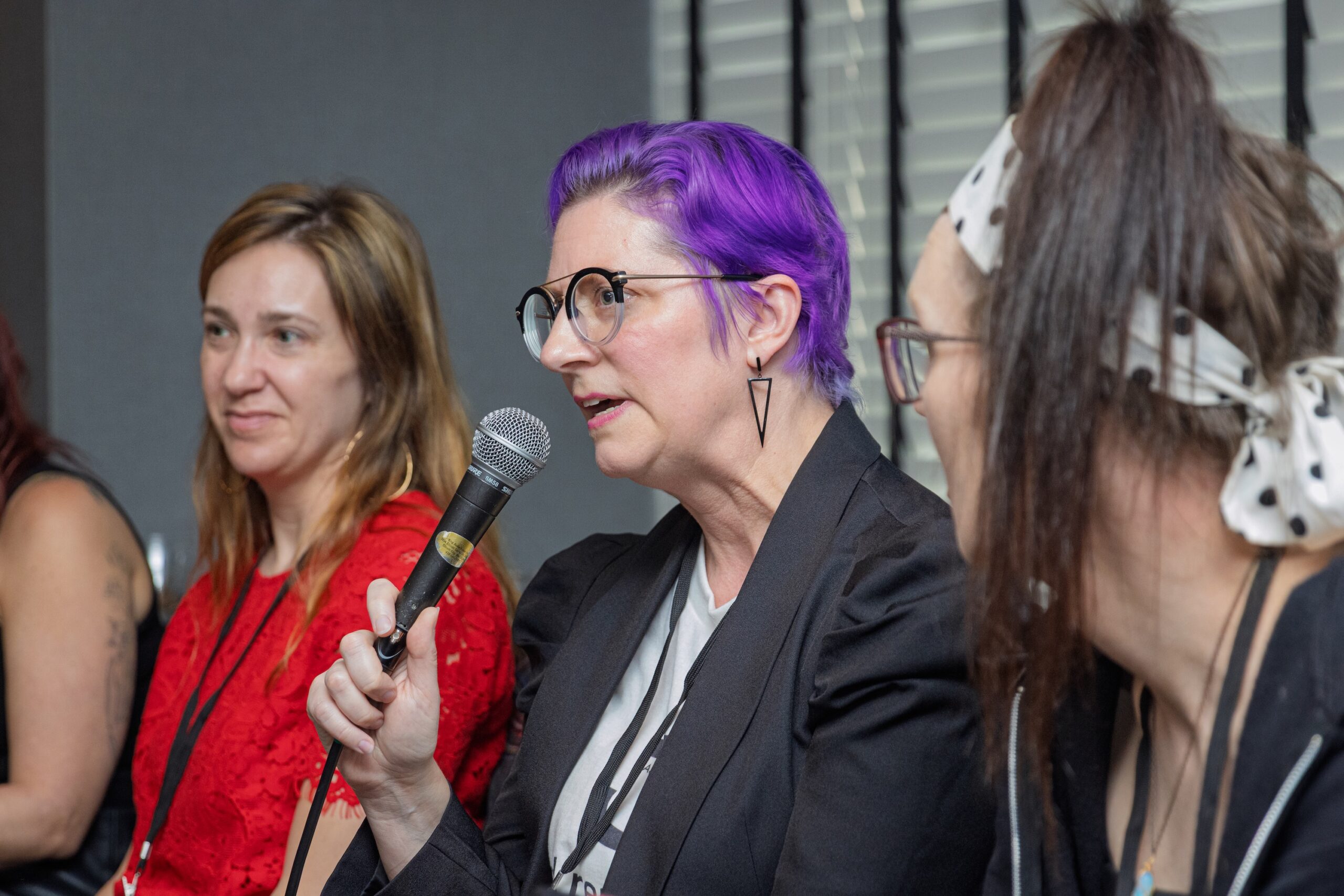 Sarah Daniels speaks into the microphone
